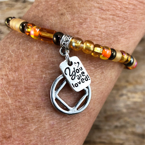 Narcotics Anonymous Golden Yellow Czech beads stretch bracelet - "You are loved"
