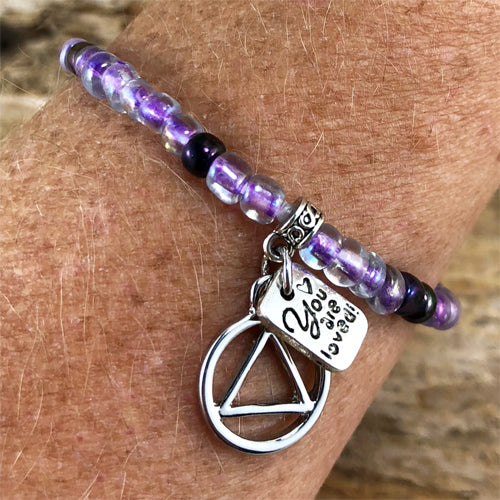 Alcoholics Anonymous -Purple Czech beads stretch bracelet - "You are loved"